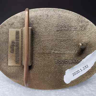 [Belt Buckle] Brelco Drilling Ltd., Antique-Bronze - Maker's Mark: View of the maker's mark, beside the hook.