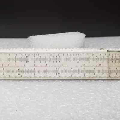 [Slide Rule] Dominion Bridge Co. Ltd./Riverside Iron & Engineering Works Ltd., White Plastic, Brown Leather - Front Slide Rule: Front view of slide rule