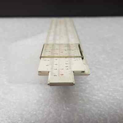 [Slide Rule] Dominion Bridge Co. Ltd./Riverside Iron & Engineering Works Ltd., White Plastic, Brown Leather - End Slide Rule, Angled: Angled end view is slide rule.