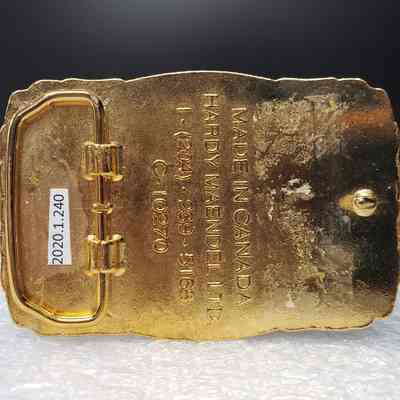 [Belt Buckle] Cage Transport Ltd., Gold Black - Back: View of the back.