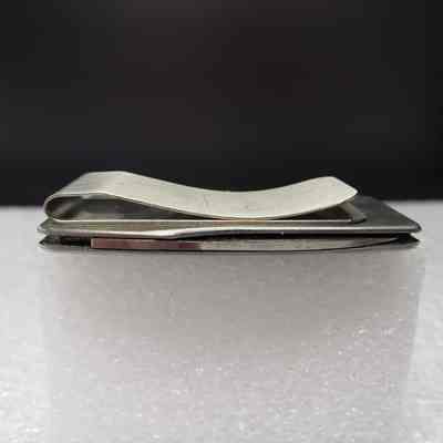 [Pocket Knife] Westcamp Catering Ltd, Money Clip, 1981 - Top Edge: View of top edge with pocket knife.