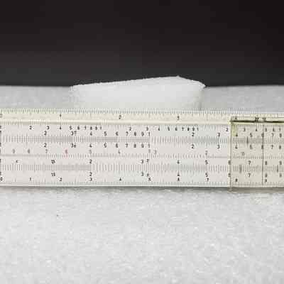 [Slide Rule] Union Carbide Chemicals and Plastics, White Plastic, Brown Leather - Front Slide Rule: Front view of slide view, with measures