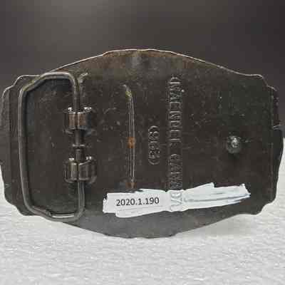 [Belt Buckle] Bert Baxter Transport, Gold Black Antique-Bronze - Back: View of the back.