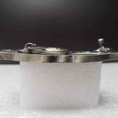 [Belt Buckle] Carnwood Wire Line Service Ltd., Antique-Silver - Side: View from the side.