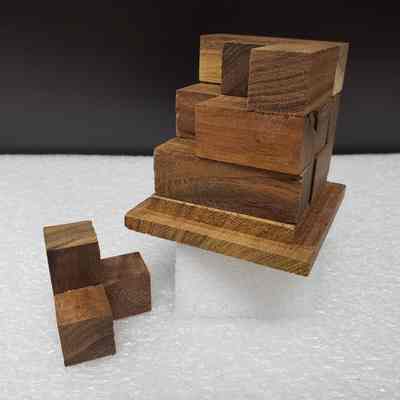 [Puzzle Cube] NOVA Corporation, Wood - Angled Pieces: Angled view of the puzzle without the acrylic cover, with piece removed.