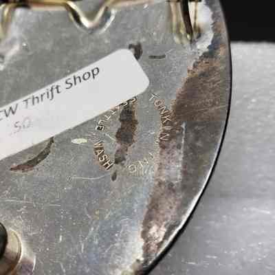 [Belt Buckle] CAT, Ornate, Silver - Maker's Mark, Middle: Close-up view of the maker's mark in the middle of the back.