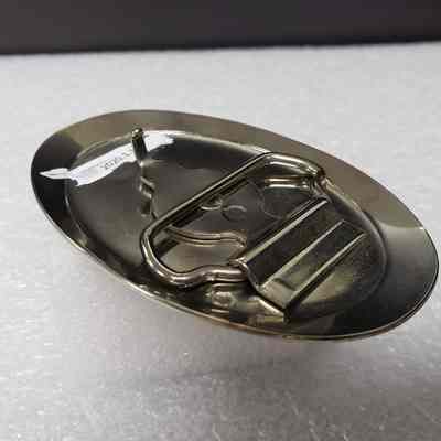 [Belt Buckle] Big John's Tong Service Ltd., Silver Red Blue - Hinge, Angled: Angled view of the hinge.