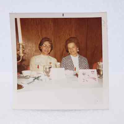 [Photo] Two Ladies Seated at a Table, Association of Desk and Derrick Clubs, Square, White Border, c.1972