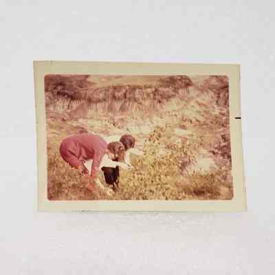 [Photo] Two Ladies Stooped Beside Foliage Beside Canyon, Association of Desk and Derrick Clubs, Small, Rectangle, White Border, c.1972
