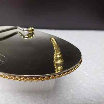 [Belt Buckle] Aspenleaf Energy Ltd., Silver Gold Blue - Hook, Angled: Angled close-up of hook