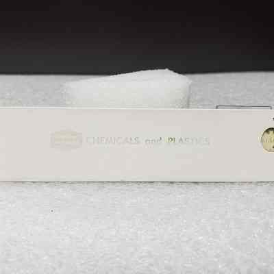 [Slide Rule] Union Carbide Chemicals and Plastics, White Plastic, Brown Leather - Back Slide Rule: Back view of slide rule, branded.
