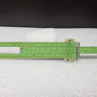 [Slide Rule] Pritchard Canadian Ltd., A. Kowalchuk, Black Leather - Back Slide Rule, Extended: Back view of slide rule, extended