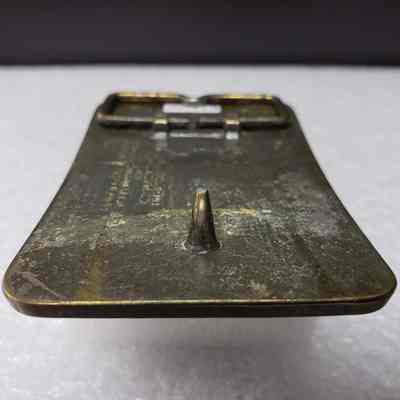 [Belt Buckle] Caterpillar Quality Products Reg'd, Bowl Scraper, Antique-Bronze - Hook: View of the hook.