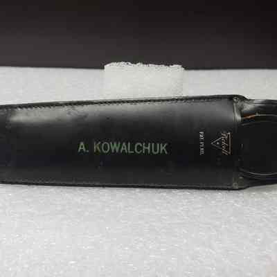 [Slide Ruler] Pritchard Canadian Ltd., A. Kowalchuk, Black Leather - Front Case: Front view of the leather case with slide ruler inside