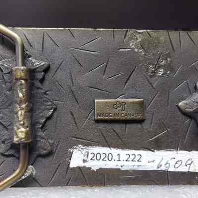 [Belt Buckle] Border Drilling Co. Ltd., Antique-Bronze - Maker's Mark: Close-up view of the maker's mark on the back.
