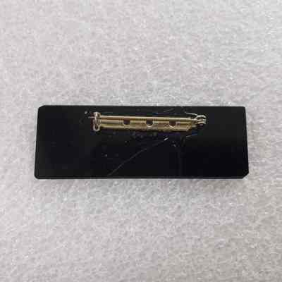[Name Tag] Carol Haggerty, Black Gold White - Back: View of back