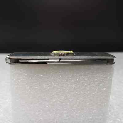 [Pocket Knife] Shell Oil, Silver Yellow - Left: View of left edge