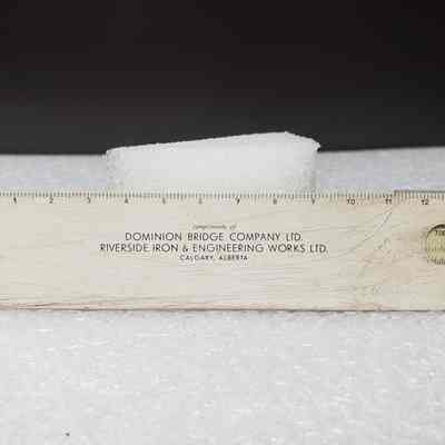 [Slide Rule] Dominion Bridge Co. Ltd./Riverside Iron & Engineering Works Ltd., White Plastic, Brown Leather - Back Slide Rule: Back view of slide rule