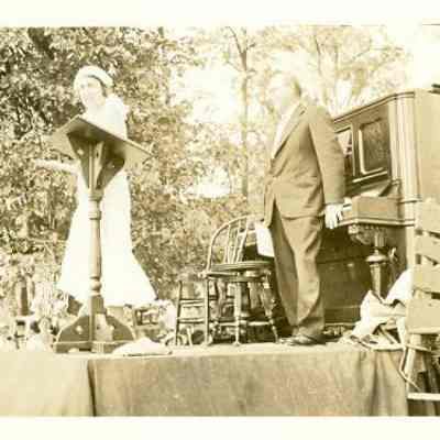Woman Speaking on Stage