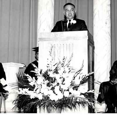 Bennett speaking at commencement