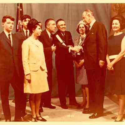 Robert Bennett shaking hands with Lyndon B. Johnson