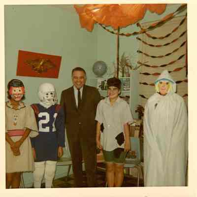 Robert Bennett with trick or treaters
