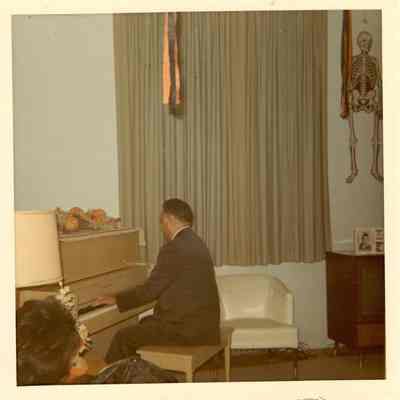 Bennett playing piano