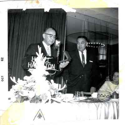 Robert Bennett receiving award