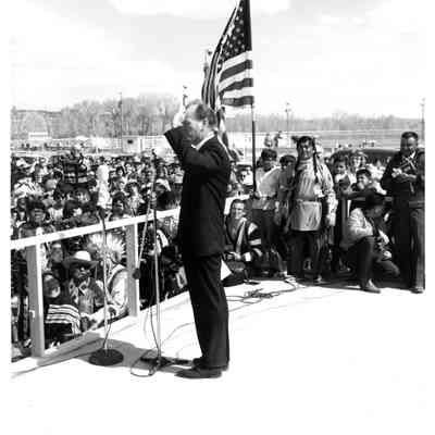 Man waving to crowd