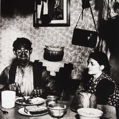 Untitled (man and wife at dinner table)