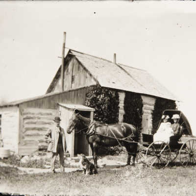 Family and Log Cabin