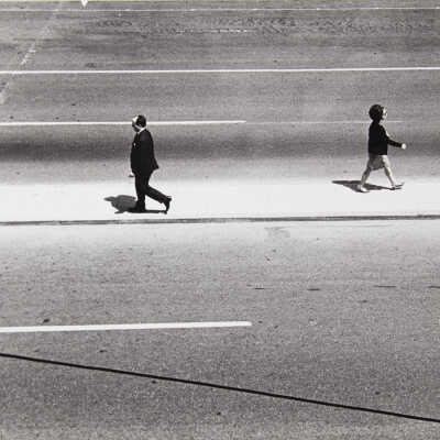 Untitled (man and woman walking in opposite directions)