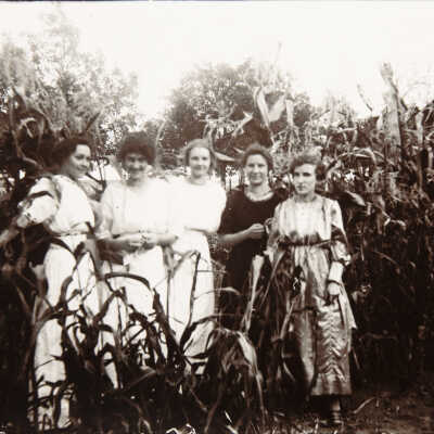 Women Standing in Corn