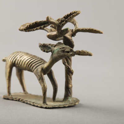 Market Tableau: Antelope Eating Tree Leaf