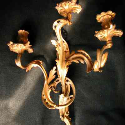 Four Gilt Metal Rococo Sconces