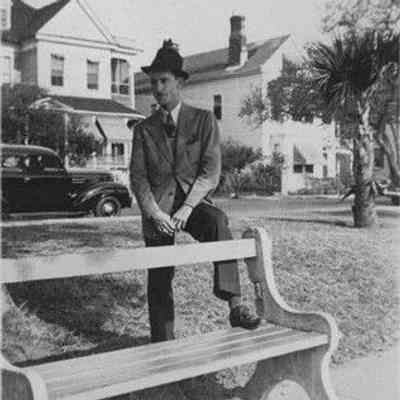 Man at Colonial Lake in Front of Rutledge Avenue Houses