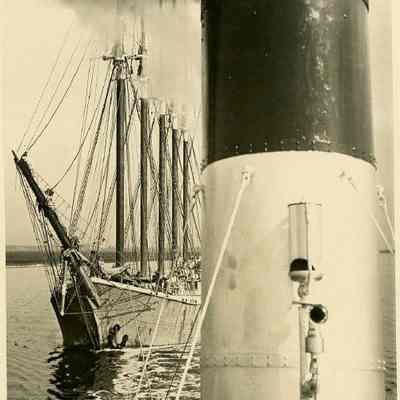 White Stock Towboat Towing Five-Masted Schooner
