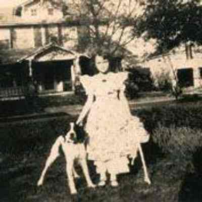 Girl Standing With Dog at 518 Huger Street
