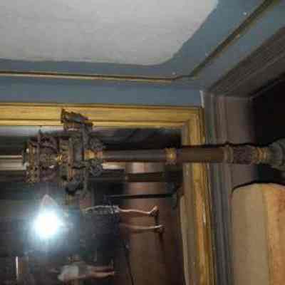 Four Cast Iron and Gilt Torchieres