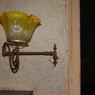 Two Gas Wall Brackets with Yellow Glass Globes