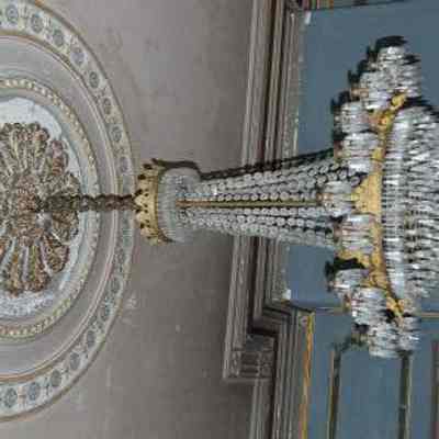One of Pair of Crystal and Gilt Chandeliers