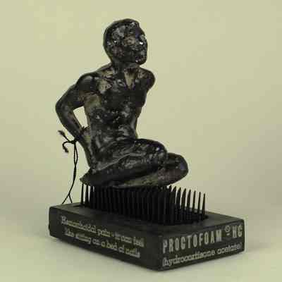 "Proctofoam HC" Advertisement in the Form of a Fakir on a Bed of Nails