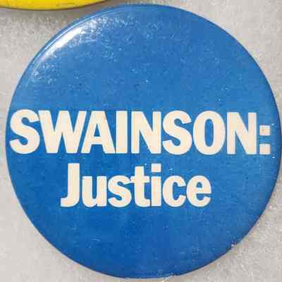 Swainson: Justice Button