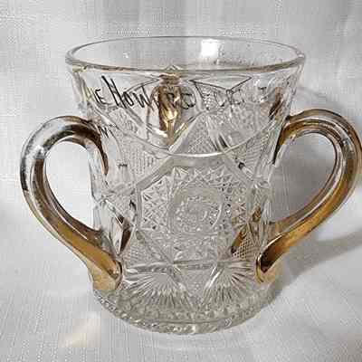 Howard Furniture Co., Lansing, EAPG Souvenir Three-Handled Cup