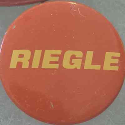 Riegle Button