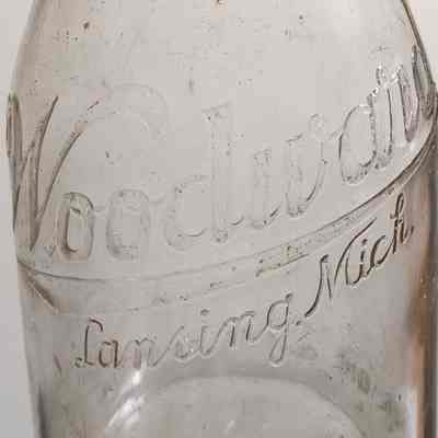 Woodward Dairy Embossed Quart Bottle