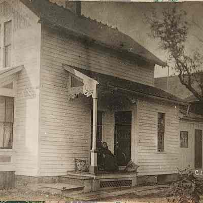 Aunt Lizzie on her Porch, Lansing RPPC