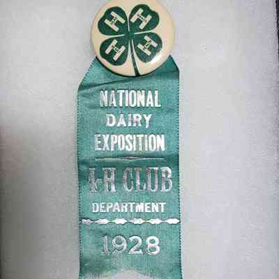 National Dairy Exposition 4-H Club Department 1928 Badge