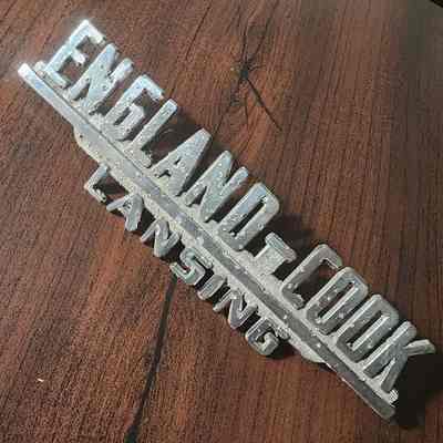 England-Cook Dealership Badge