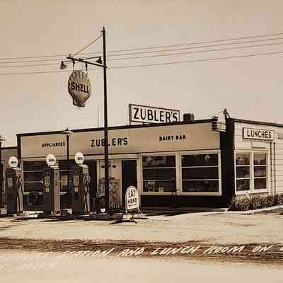 Zubler's Service Station and Lunch Room on U.S. 27, Harrison, Mich., RPPC